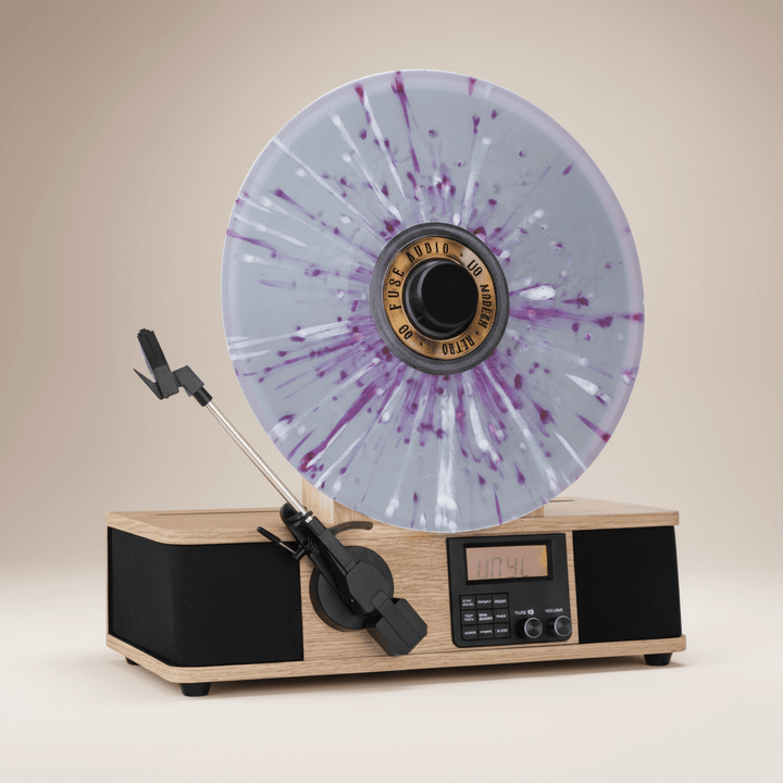 Turntable with a vinyl record on a beige background