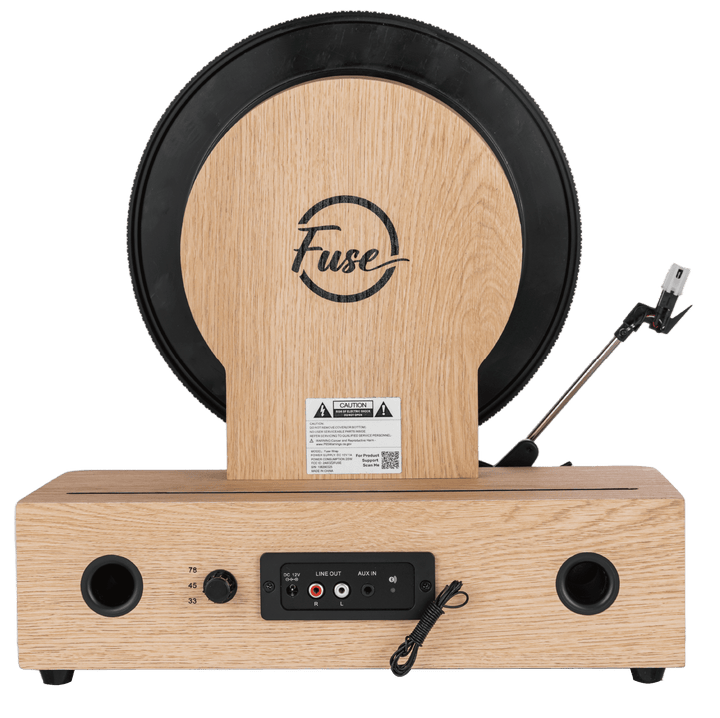 Wooden electronic drum pad with 'Fuse' branding on a white background