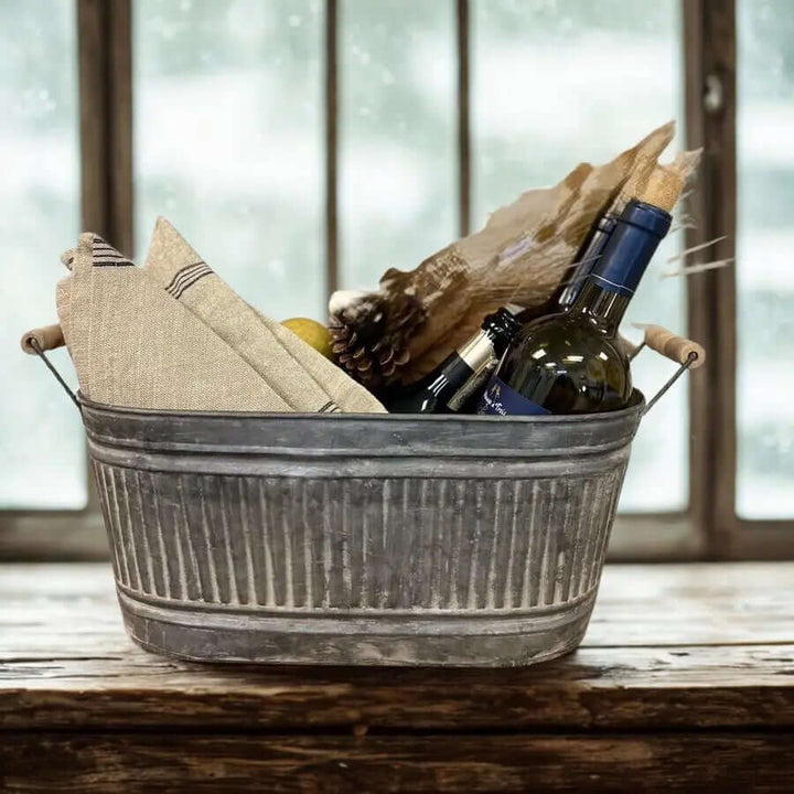 Galvanized Iron Tray with Wood Handles holding art and garden tools