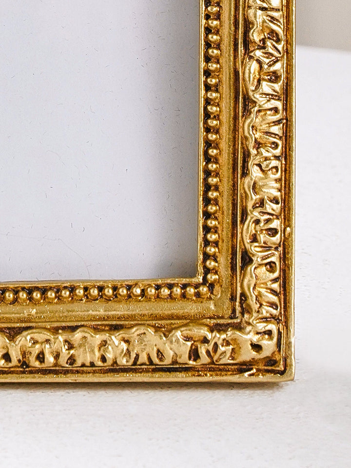 Close detail of beaded trim on a Gilded Baroque Arch Photo Frame