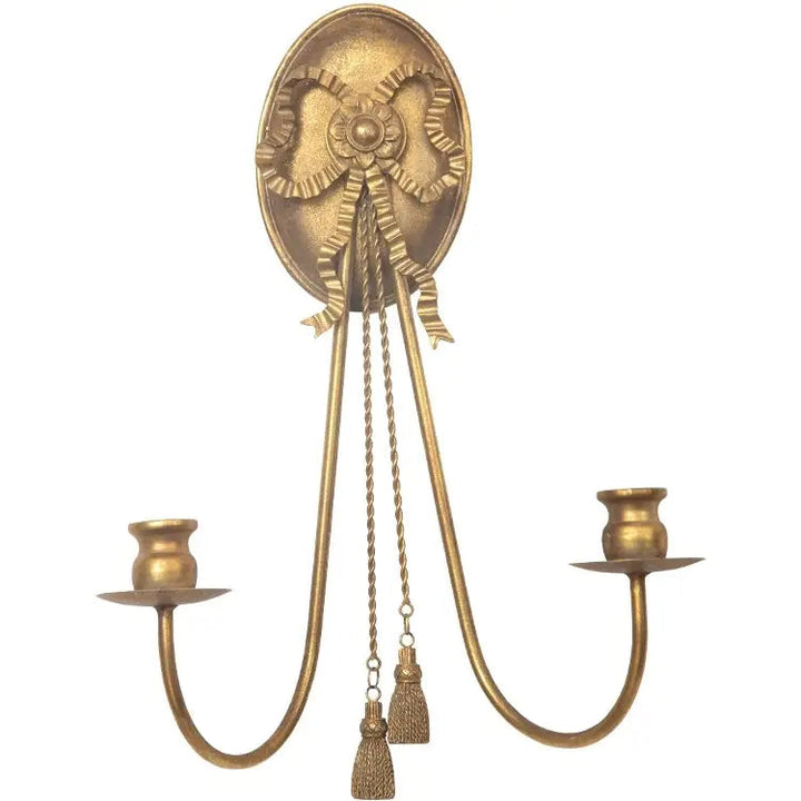 Back plate and mounting detail on the gilded wall sconce