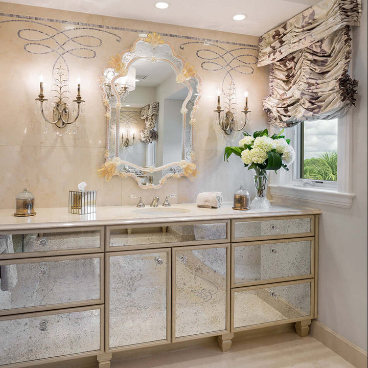 Luxurious bathroom vanity with decorative mirror and lighting