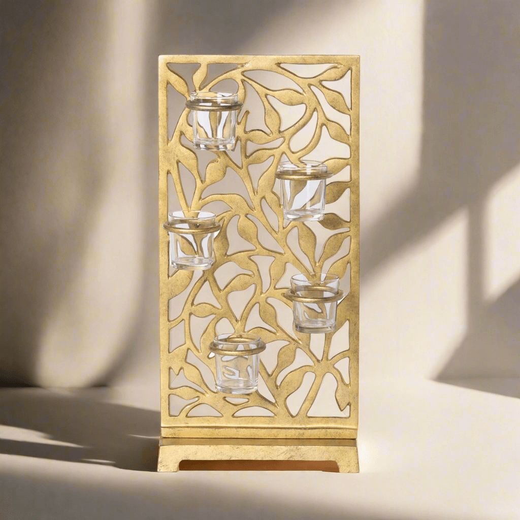 Gold Metal Jasmine Vine Votive Candle Holder with Glass Cups featuring intricate leaf cut-out design for elegant illumination.