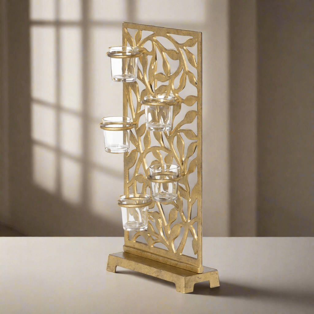 Gold Metal Jasmine Vine Votive Candle Holder with Glass Cups casting elegant shadows
