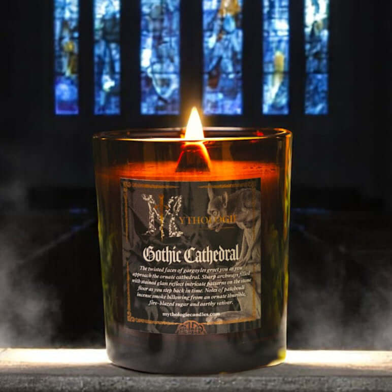 Gothic Cathedral Candle with flickering flame in medieval-inspired setting, evoking mystery and solemn beauty with patchouli and incense scent.