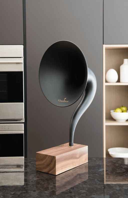 Gramovox Bluetooth Gramophone Speaker with vintage design and modern acoustics, displayed on a kitchen countertop.