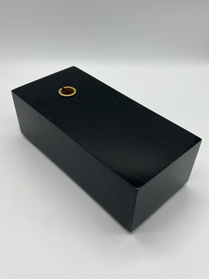 Black rectangular base of the Gramovox Bluetooth Gramophone Speaker with a brass connector.