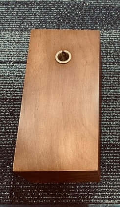 Top view of wooden base of Gramovox Bluetooth Gramophone Speaker showcasing vintage design.