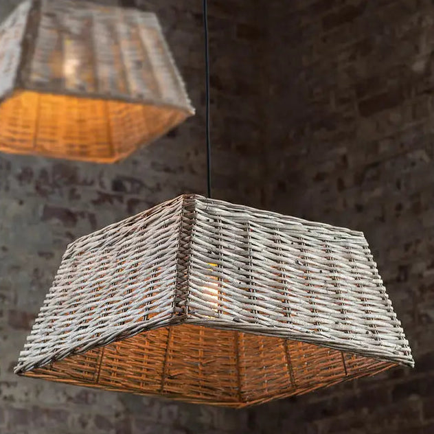Gray willow pendant shades showing flared sides and open weave