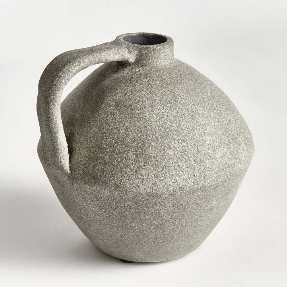 Handcrafted gray terracotta amphora style decorative vase with textured finish and curved handle.