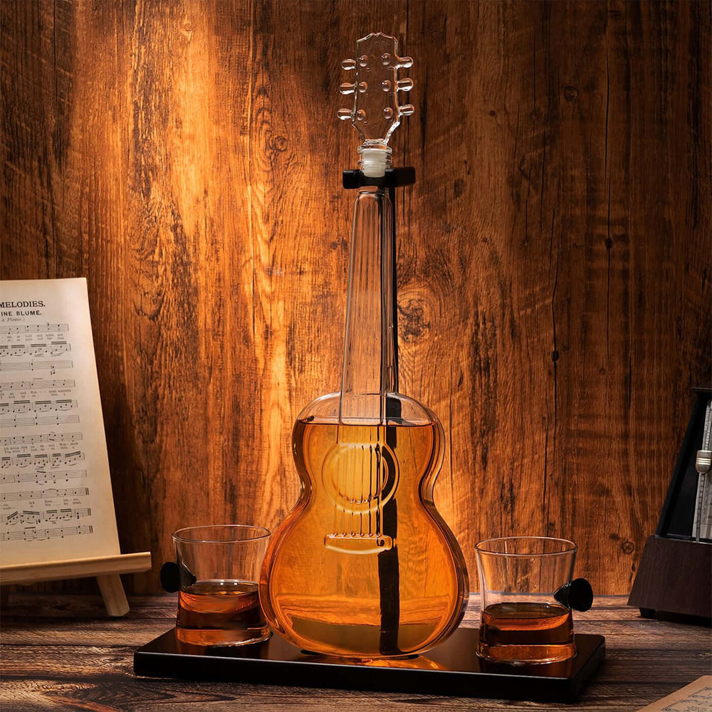Guitar Whiskey Decanter Set with Glasses and Mahogany Base on a wooden surface showcasing craftsmanship.