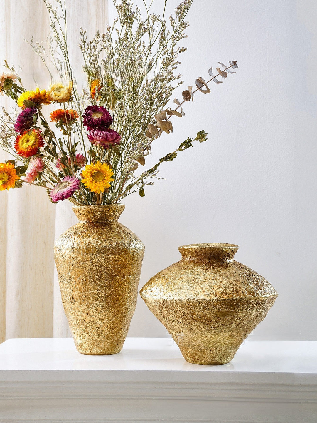 Hammered Gold Decorative Vases styled together with dried florals