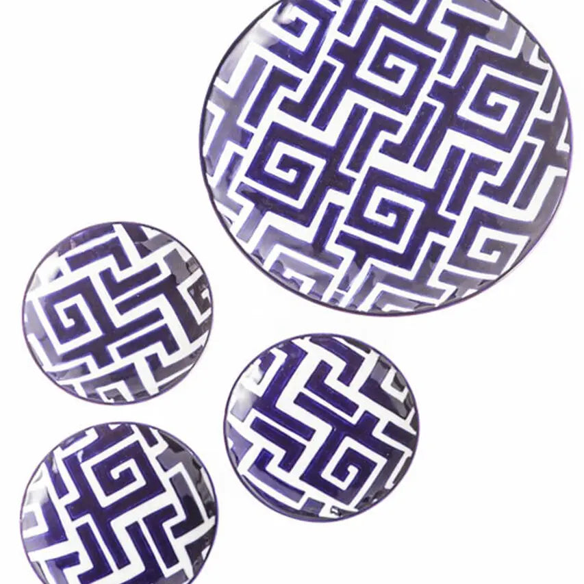 Blue and white ceramic plates styled for appetizers and salad