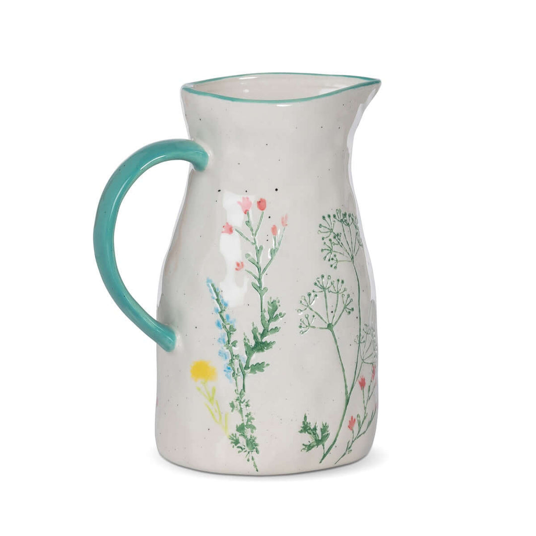 Hand-Painted Ceramic Wildflower Pitcher adorned with pastel wildflower motifs, perfect for adding cottagecore charm to your home decor.