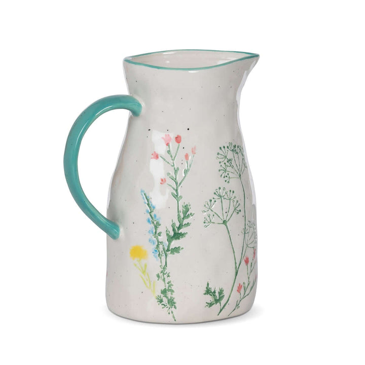 Hand-Painted Ceramic Wildflower Pitcher adorned with pastel wildflower motifs, perfect for adding cottagecore charm to your home decor.