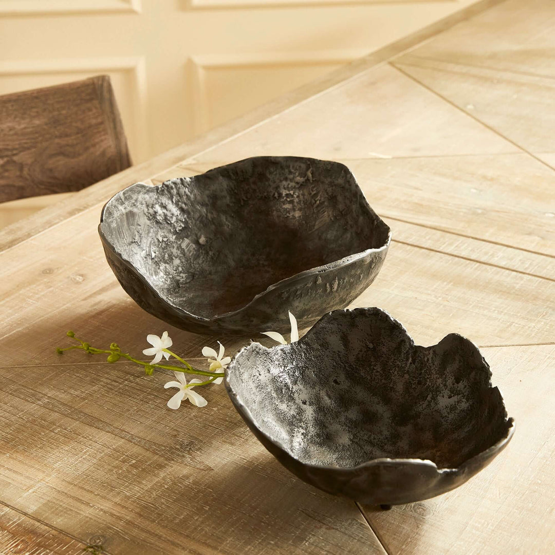 Hand-sculpted bronze decorative bowls set, echoing vintage elegance with textured surfaces and an oil-rubbed finish.
