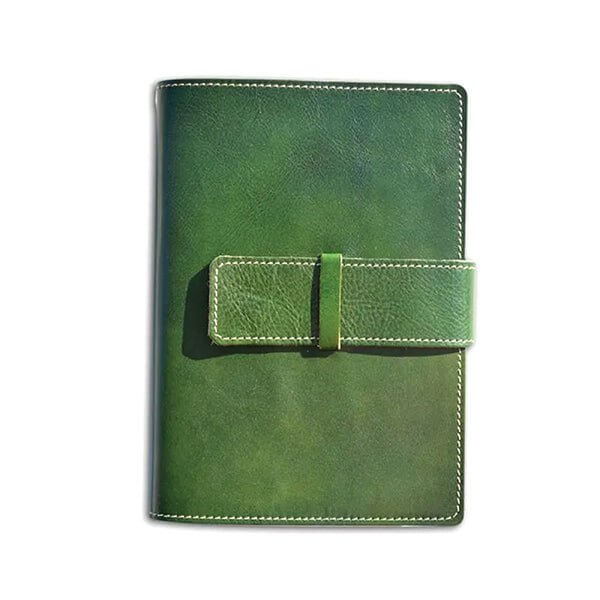 Handcrafted Italian Calfskin Leather Journal with green cover and strap closure, artisan-made in Rome, Italy.