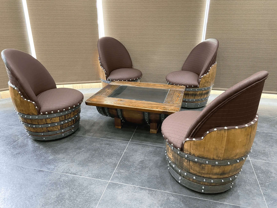 Handcrafted Vintage Oak Barrel Coffee Table and Chairs set showcasing rustic farmhouse design with oak wine barrels and padded chairs.
