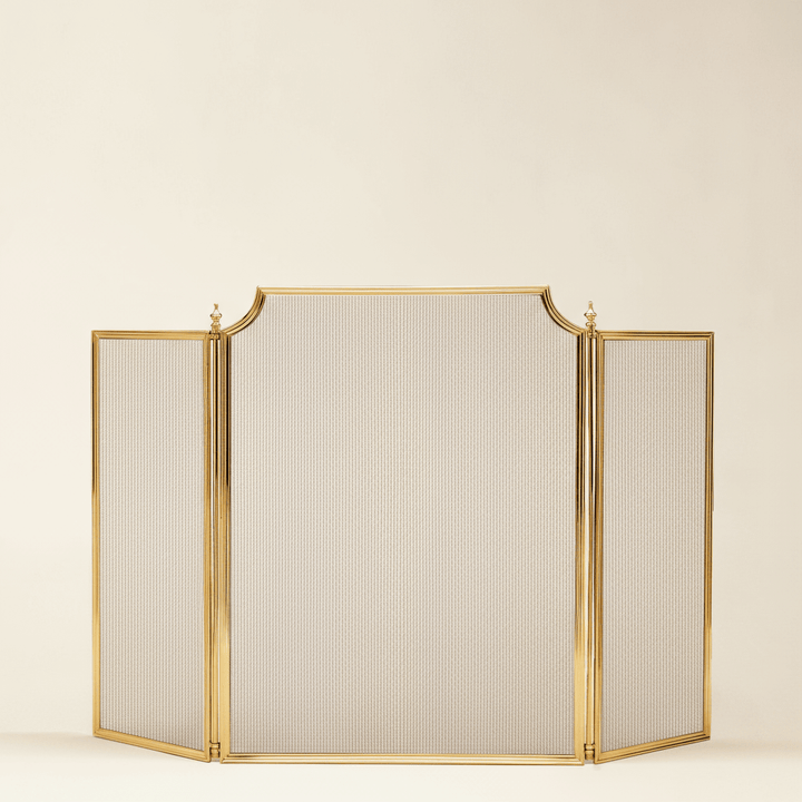 Handcrafted Italian Brass Fireplace Screen for elegant home decor, enhancing warmth with vintage glamour and artistry