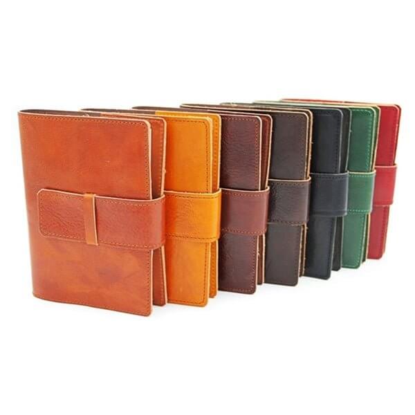 Handcrafted Italian Calfskin Leather Journal in assorted colors, showcasing quality craftsmanship and authentic calfskin leather.