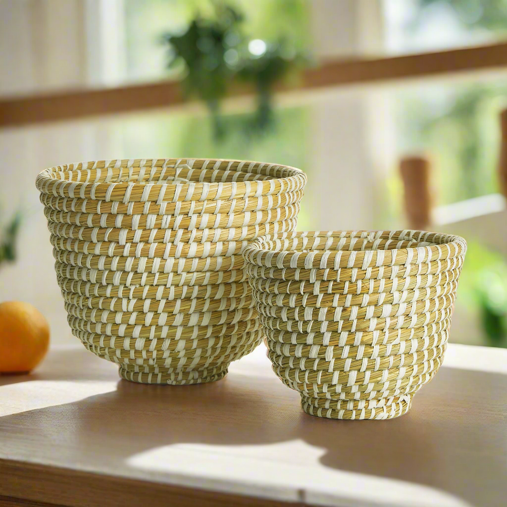 Handwoven rivergrass fruit bowls set of 2, featuring a natural coiled design and earthy tones for rustic kitchen decor.