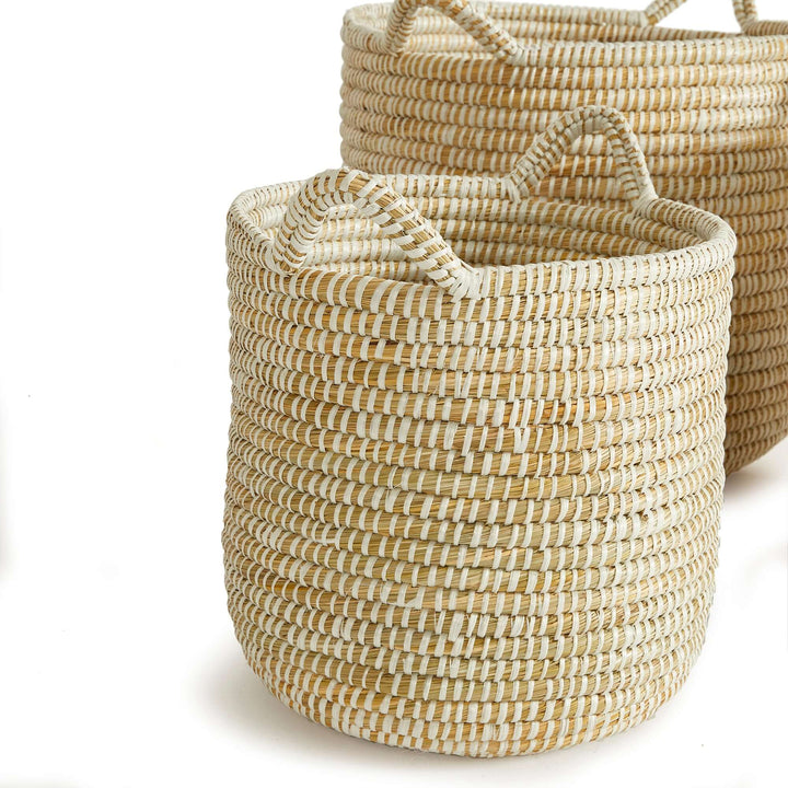 Handwoven rivergrass storage baskets for coastal decor, showcasing natural texture and earthy hues.