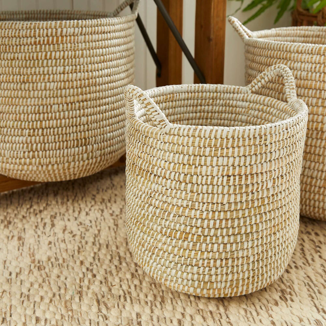 Handwoven rivergrass storage basket, ideal for coastal decor, showcasing natural textures in earth tones.