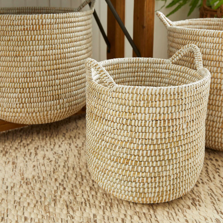 Handwoven rivergrass storage basket, ideal for coastal decor, showcasing natural textures in earth tones.