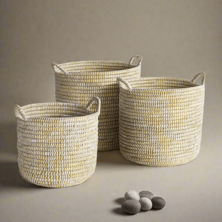 Set of 3 handwoven rivergrass storage baskets for coastal decor with earthy tones and texture.