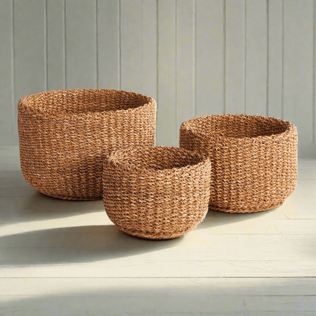 Set of 3 handwoven seagrass storage baskets, showcasing natural texture and earthy elegance.