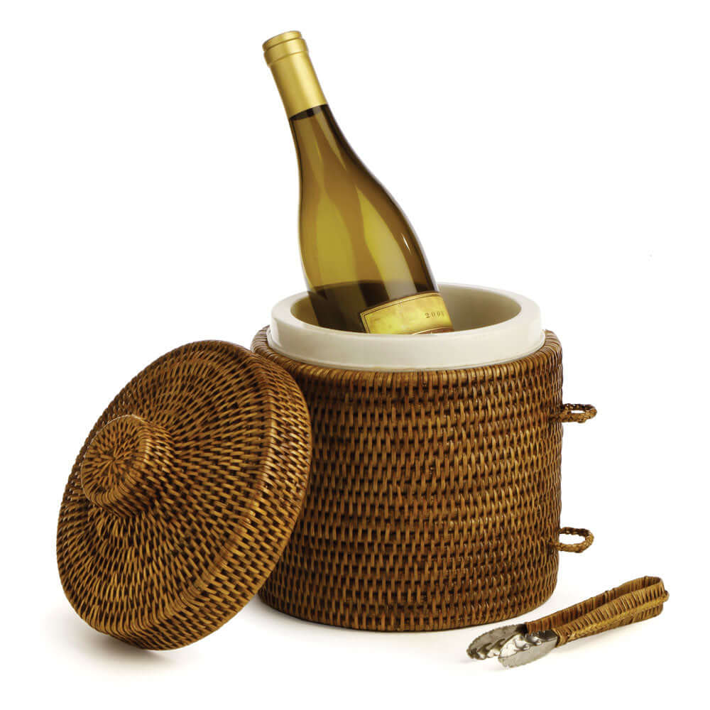 Handwoven vintage rattan ice bucket with tongs, featuring a wine bottle inside, showcasing timeless elegance.