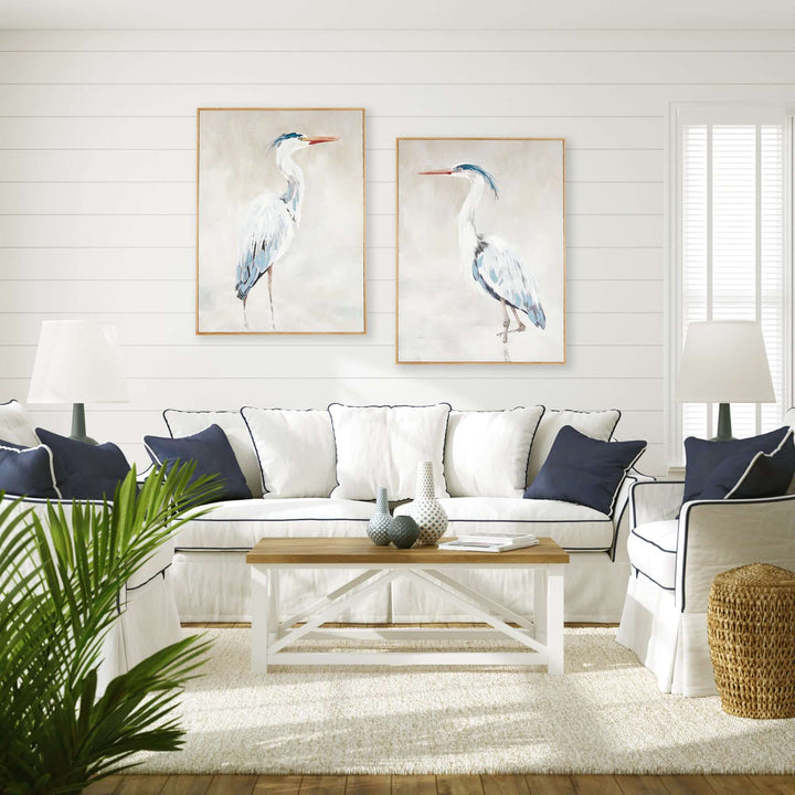 Heron Pair Giclée Canvas Prints with Wood Frames displayed in an elegant living room setting.