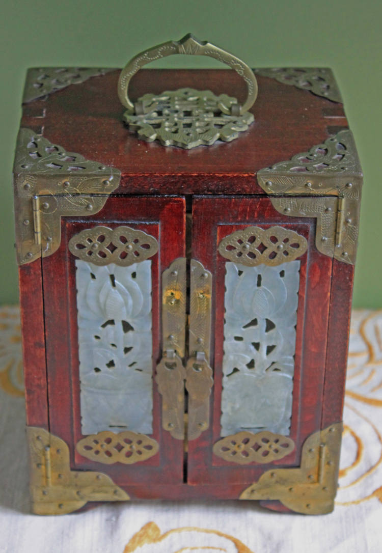 Handmade Vintage Wooden Jewelry Cabinet, Jade Insert Doors, Brass Hardware with ornate handle and decorative hardware.