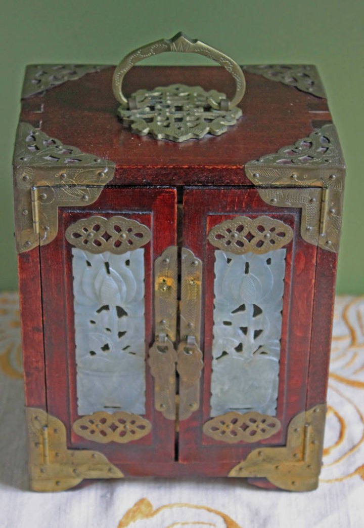 Handmade Vintage Wooden Jewelry Cabinet, Jade Insert Doors, Brass Hardware with ornate handle and decorative hardware.