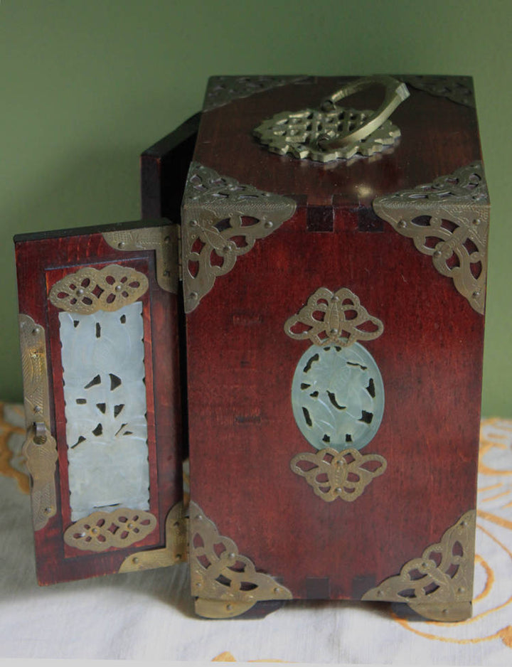 Handmade Vintage Wooden Jewelry Cabinet, Jade Insert Doors, Brass Hardware with intricate details and jade inlays.