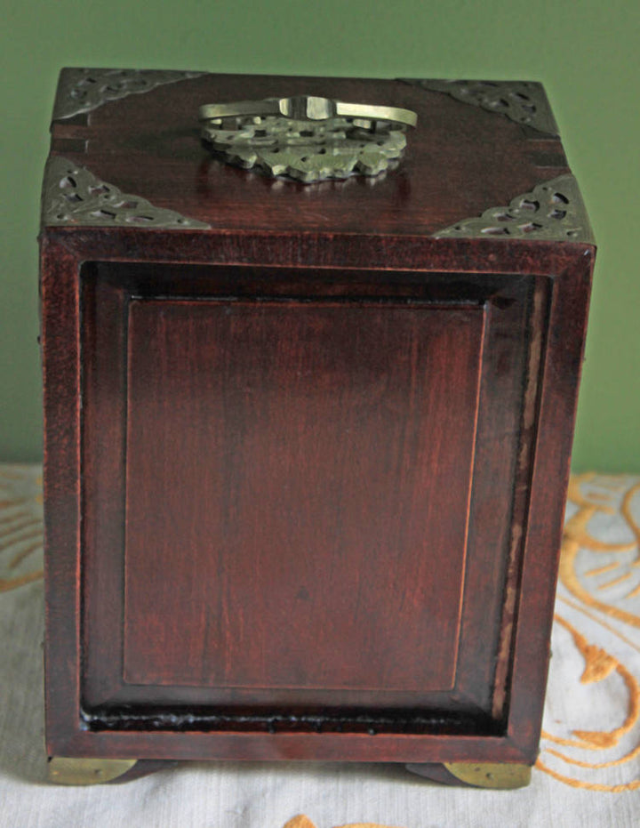 Handmade Vintage Wooden Jewelry Cabinet, Jade Insert Doors, Brass Hardware with ornate brass handle on top.