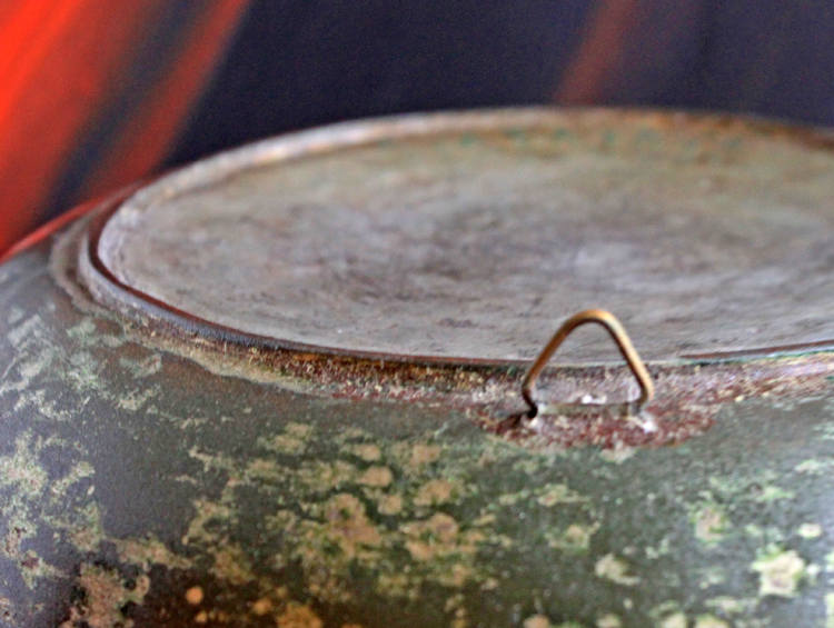 Antique Indian Hammered Copper Bowl – Large Hand-Pounded Tinned Rustic Pan showing the textured surface and handle detail.