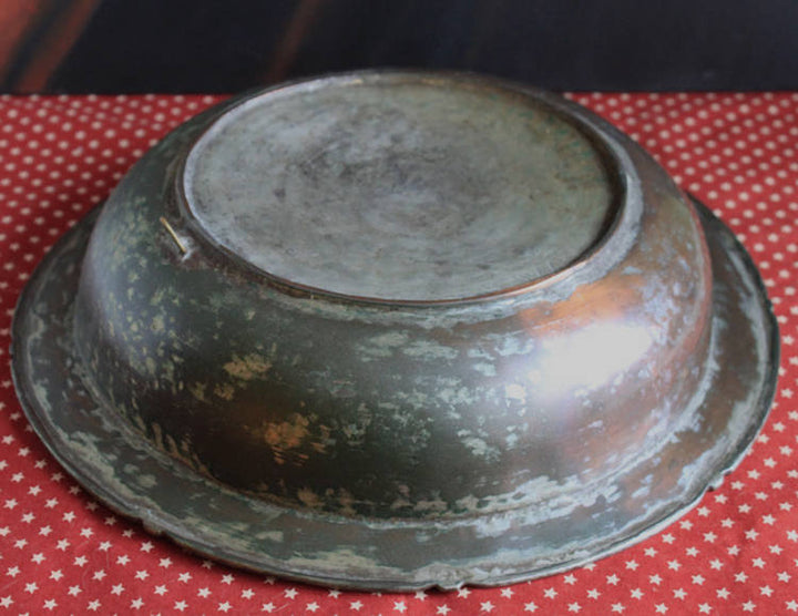 Antique Indian Hammered Copper Bowl – Large Hand-Pounded Tinned Rustic Pan viewed from above on a patterned tablecloth.