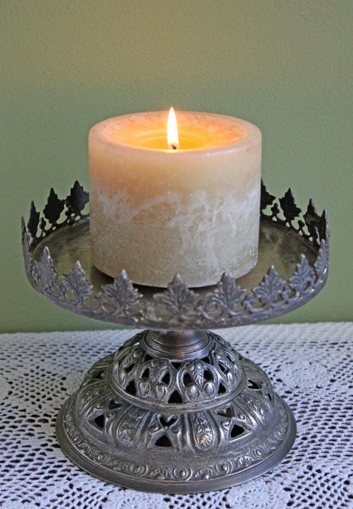 Antique Pillar Candle Holder/Silver Plated Candle Stand/Art Nouveau Relief. Fine Dining. Featuring a lit candle.