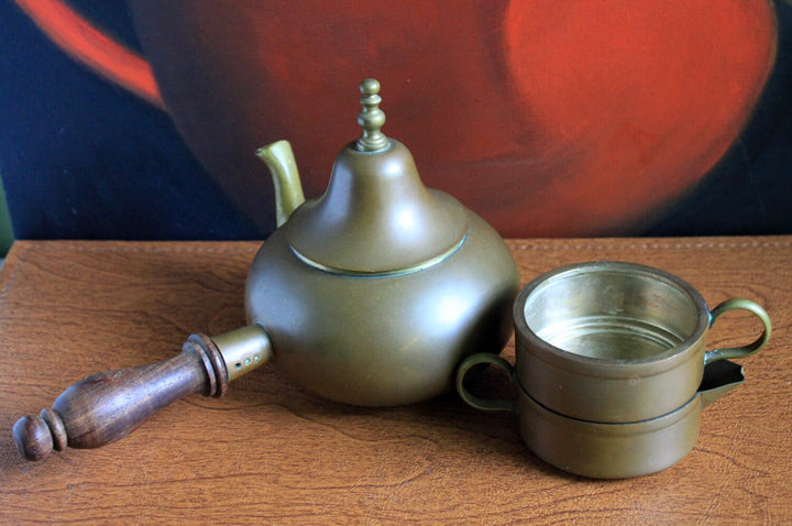Antique Copper Turkish Coffee Maker Set, Wooden Handle, Tin Lined with creamer and cup on wooden surface.
