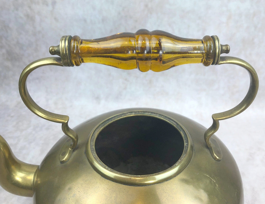 Antique Brass Kettle with Yellow Glass Handle, Footed Teapot, Home Decor - close-up of handle and kettle.