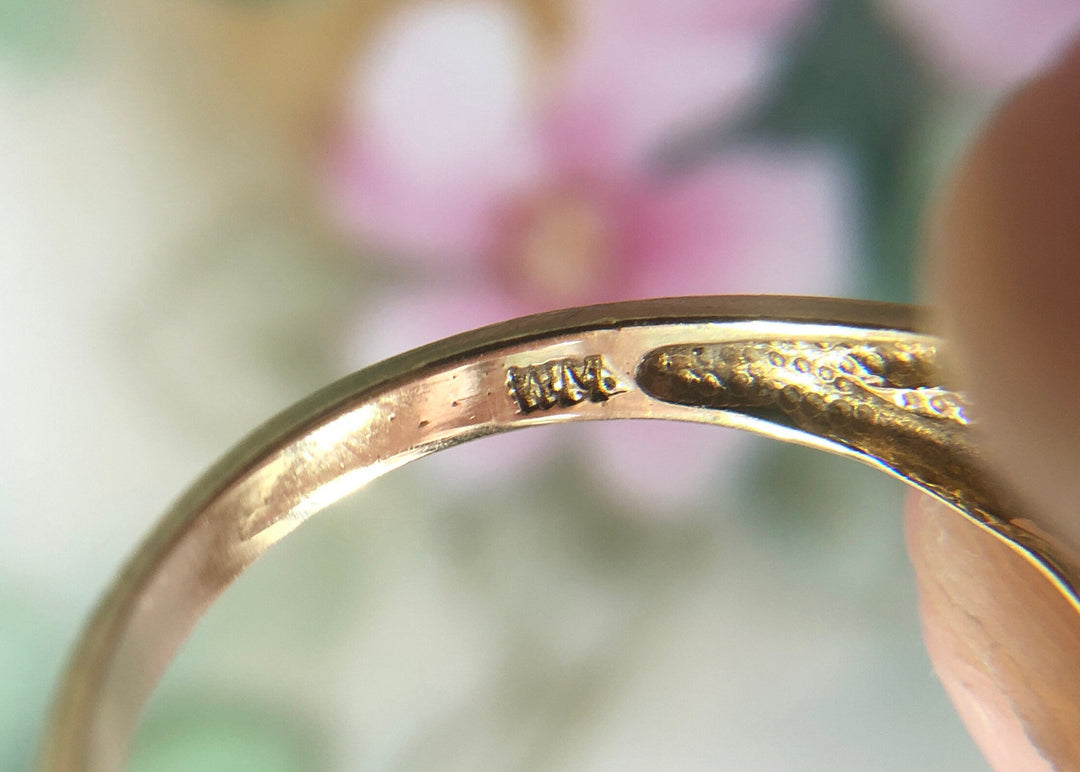 Vintage 10k Gold Ring with 5 Blue Topaz Stones hallmarks and acid tested mark on the inside of the band.