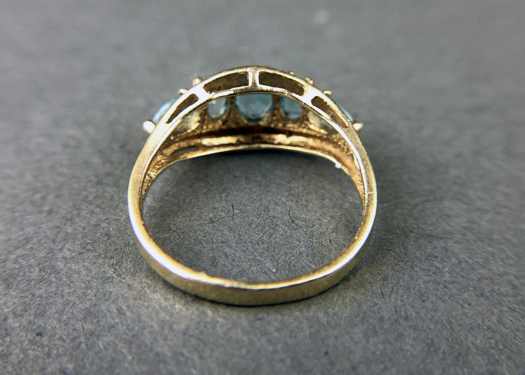 Vintage 10k Gold Ring with 5 Blue Topaz Stones, showing the underside view of the ring.