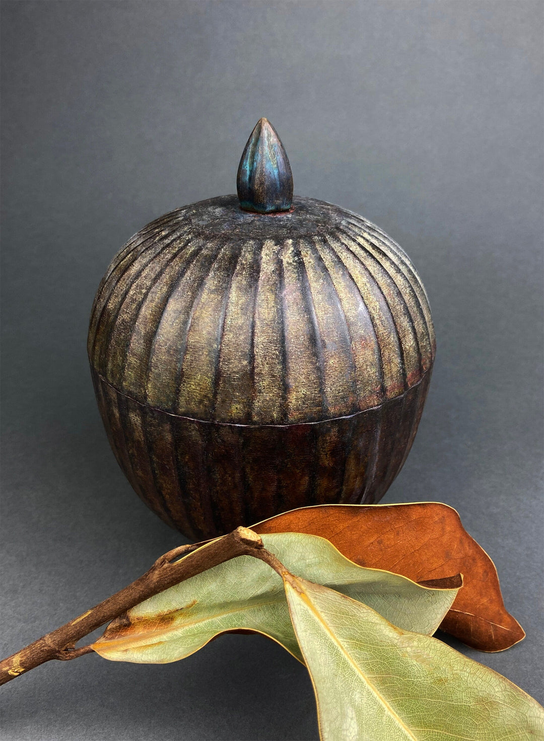 Vintage Fluted Metal Jar with Lid for Rustic Home Decor - Round trinket box with fluted detail.