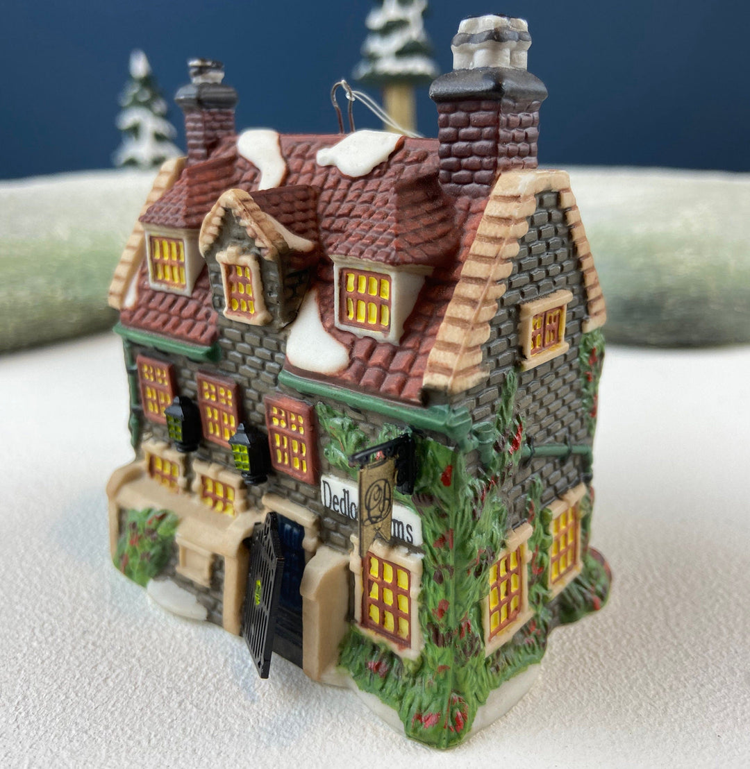 Set of 3 Tree Ornaments by Dept 56. Porcelain Hand Painted Bldgs.: Dedlock Arms, Santa's Workshop, and Dickens'Village Mill.