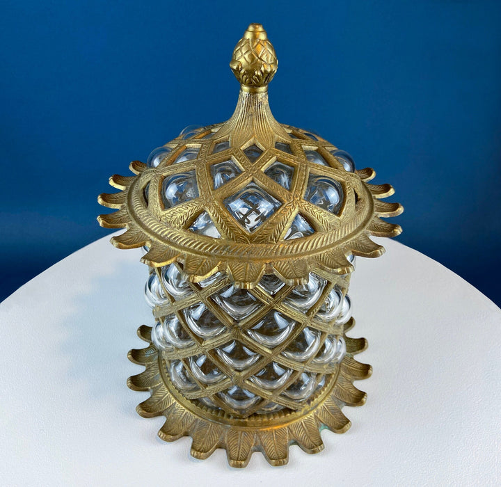 Vintage Hand Blown Bubble Glass Brass Urn Jar, Pineapple Design on display with intricate metal detailing.
