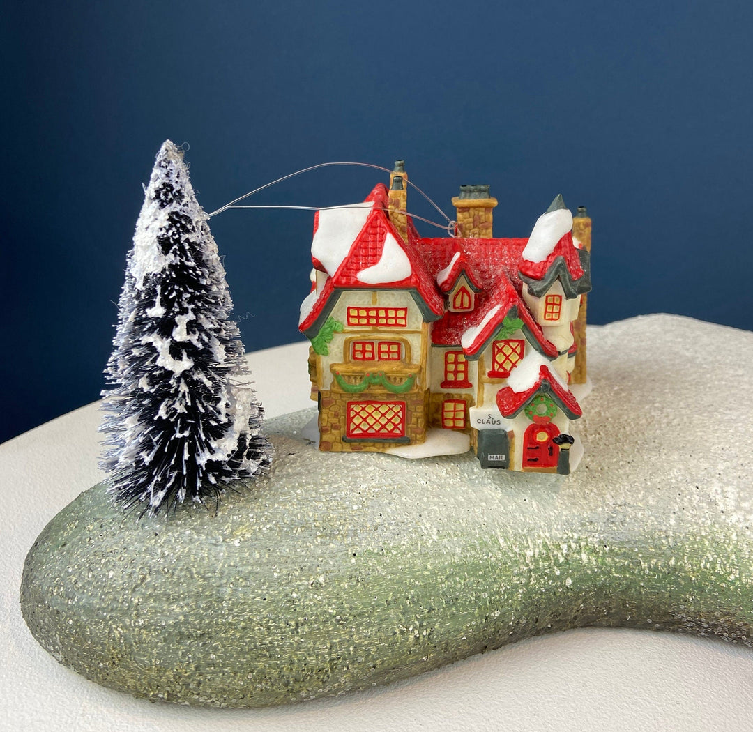 Set of 3 Tree Ornaments by Dept 56. Porcelain Hand Painted Bldgs.: Dedlock Arms, Santa's Workshop, and Dickens'Village Mill.