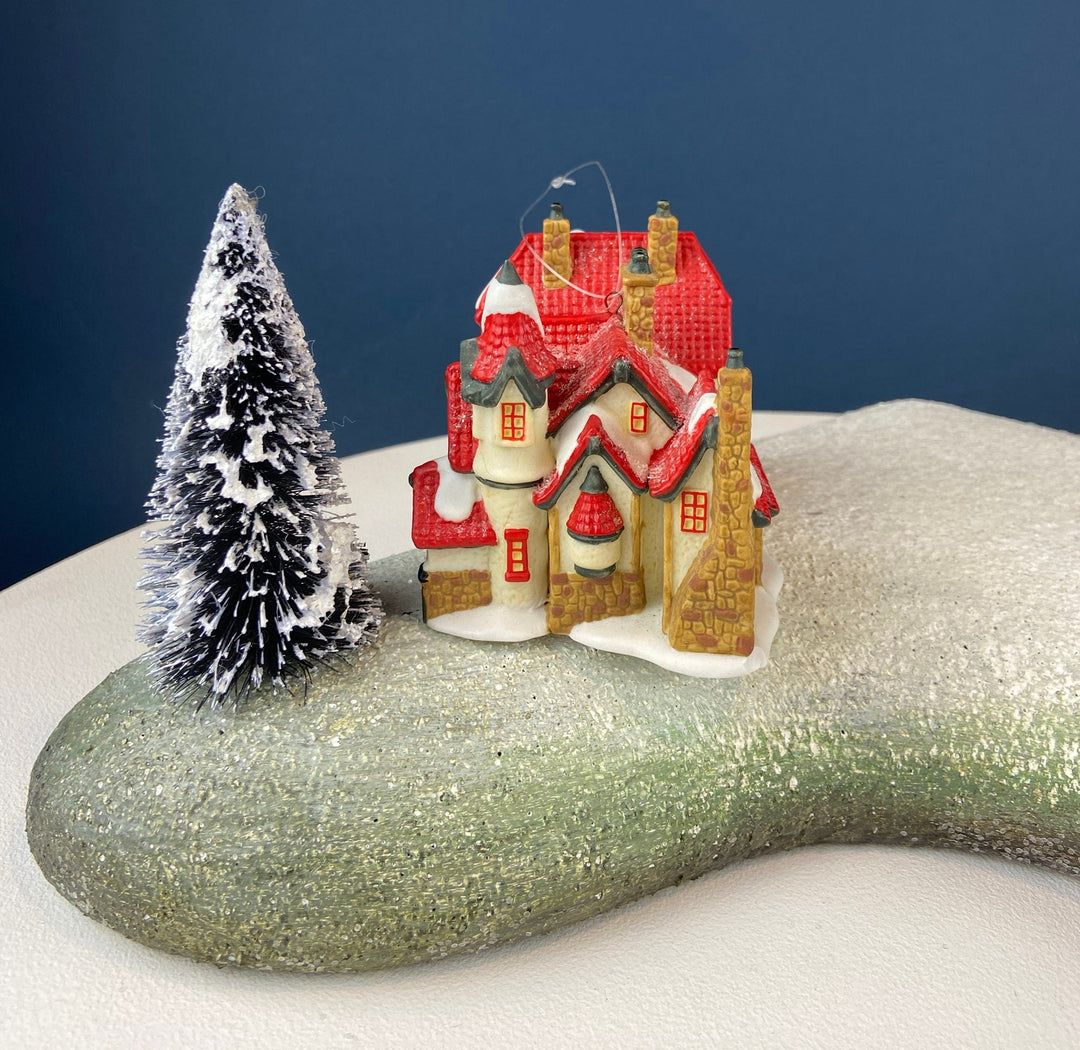 Set of 3 Tree Ornaments by Dept 56. Porcelain Hand Painted Bldgs.: Dedlock Arms, Santa's Workshop, and Dickens'Village Mill.
