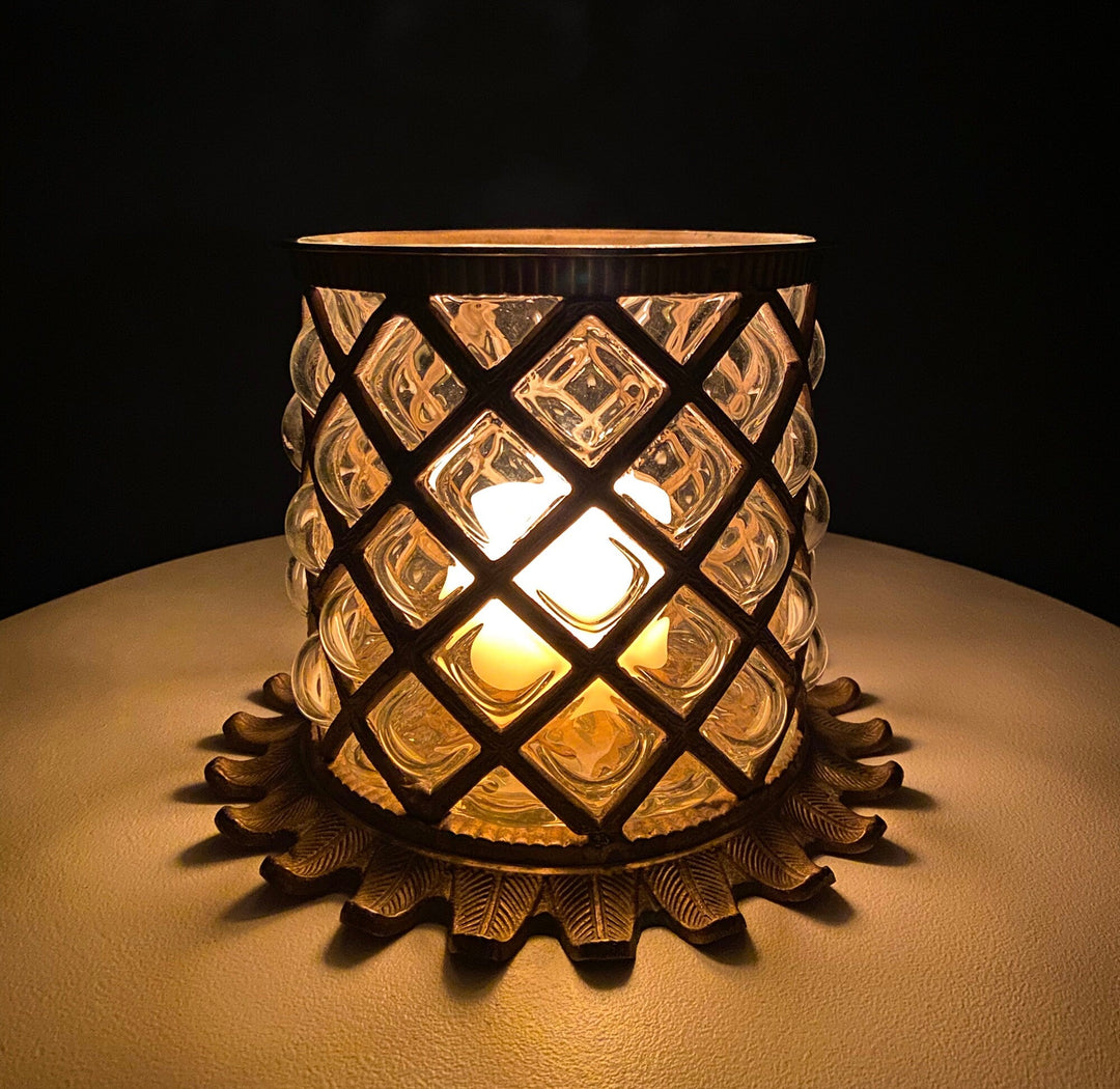 Vintage Hand Blown Bubble Glass Brass Urn Jar, Pineapple Design candle holder with warm light.