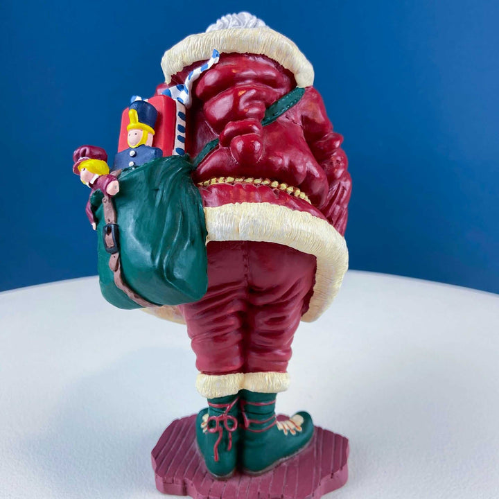 Vintage Santa Figurine with Gifts and Bells by Department 56